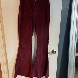 Dark red bell bottom pants. I love these